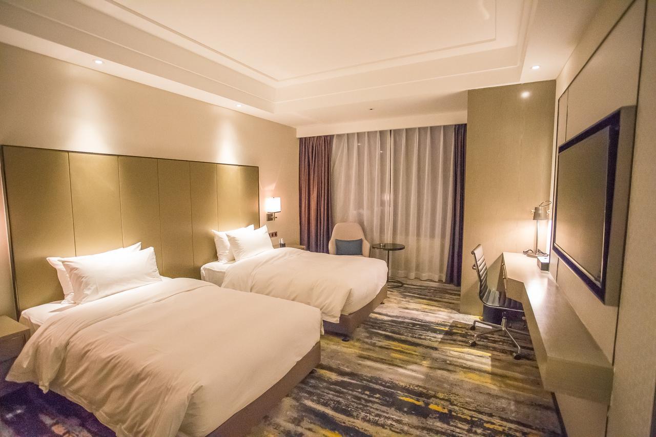Brandi Hotel Foshan Exteriör bild